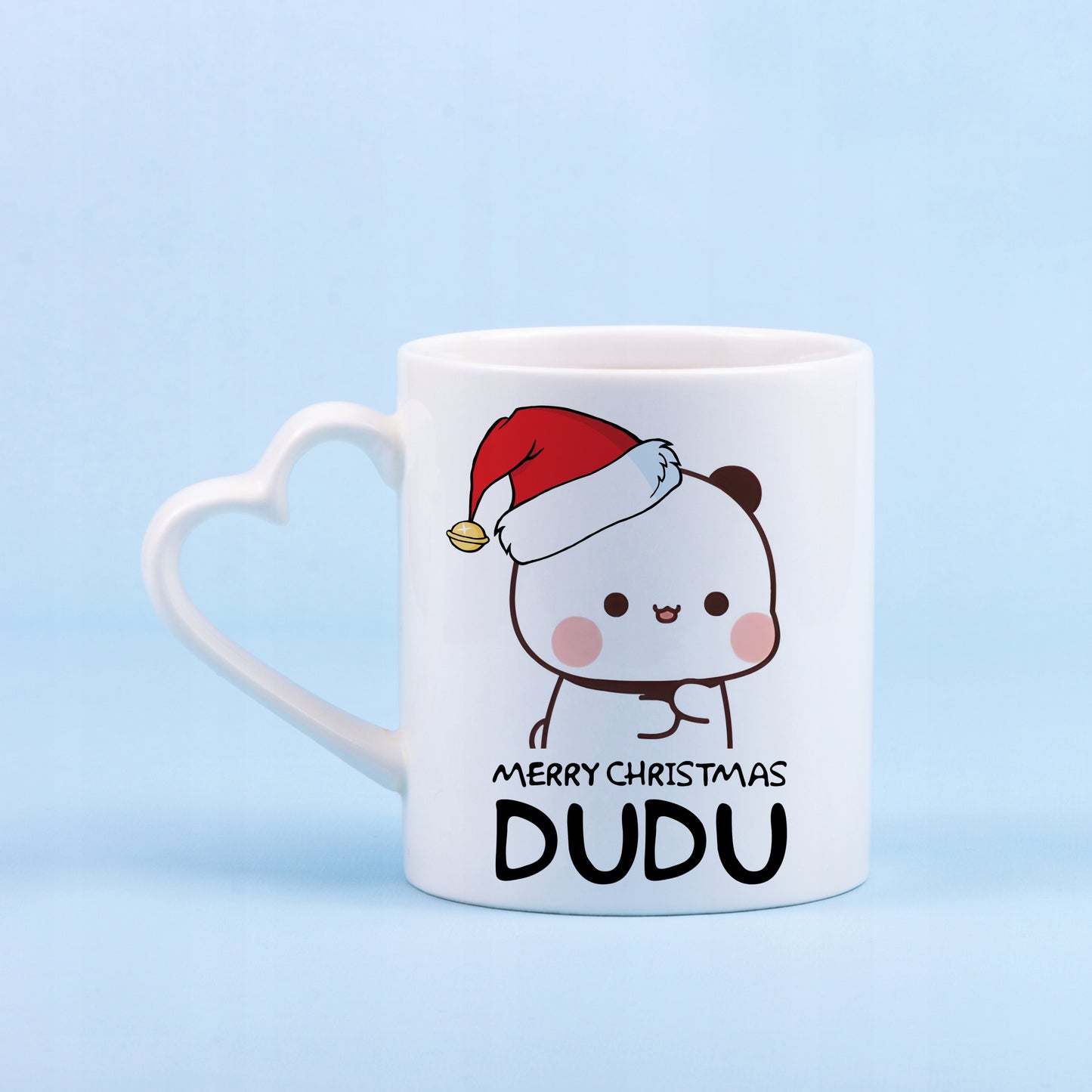 Rinkinys 2 baltų puodelių su širdelės rankena – dovana MERRY CHRISTMAS BUBU I DUDU