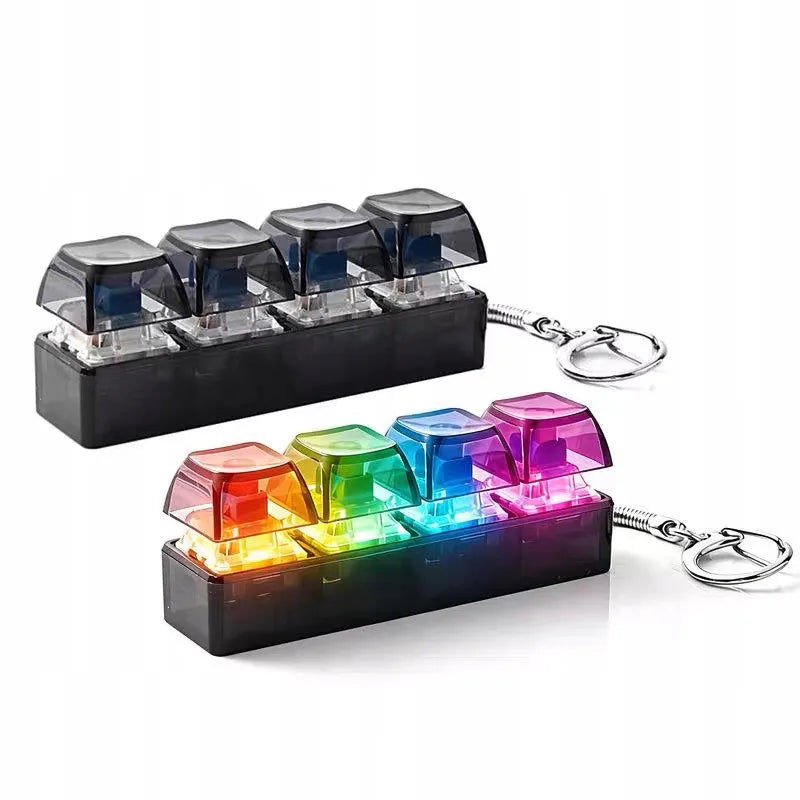 4 klavišų „clicker“ tipo antistresinis žaislas, klaviatūros imitacija, raktų pakabukas