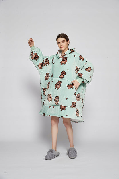 Šiltas "oversize" tipo "kocobluzos" (pledo tipo bliuzonas) 2 viename, su gobtuvu, kišenėmis, imitacija "misi" (avies vilnos tipo) ir dirbtiniu kailiu, patogus