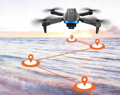 DRONAS E99 2x KVIETIKĖ SU 500M DIAPAZONU, SKRIEDIMO NETURIANČIOS TECHNOLOGIJOS, WIFI + DĖKLAS SU NUOTOLINIU VALDYMU