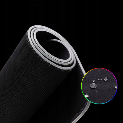 Didelis RGB XXL žaidimų pelės kilimėlis su LED apšvietimu ant stalo
