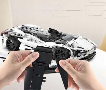 CADA konstruktorius NUOTOLINIU BŪDU VALDOMAS SPORTINIS AUTOMOBILIS SUPER STORM 30CM 402 dalys DUAL