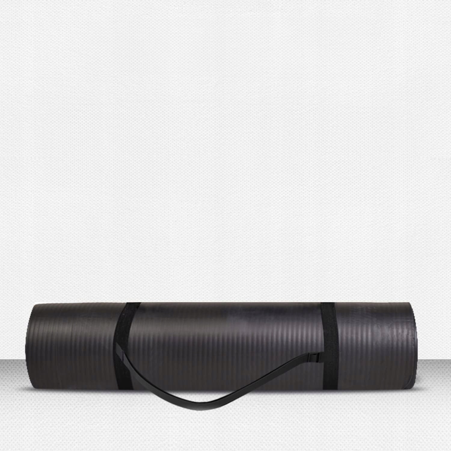 Guminis jogos ir pilateso kilimėlis treniruotėms sporto salėje