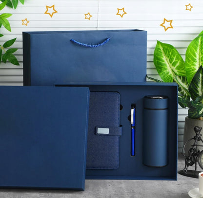 Mėlynas termopuodelio ir užrašinės dovanų rinkinys Kalėdoms ir dovanoms