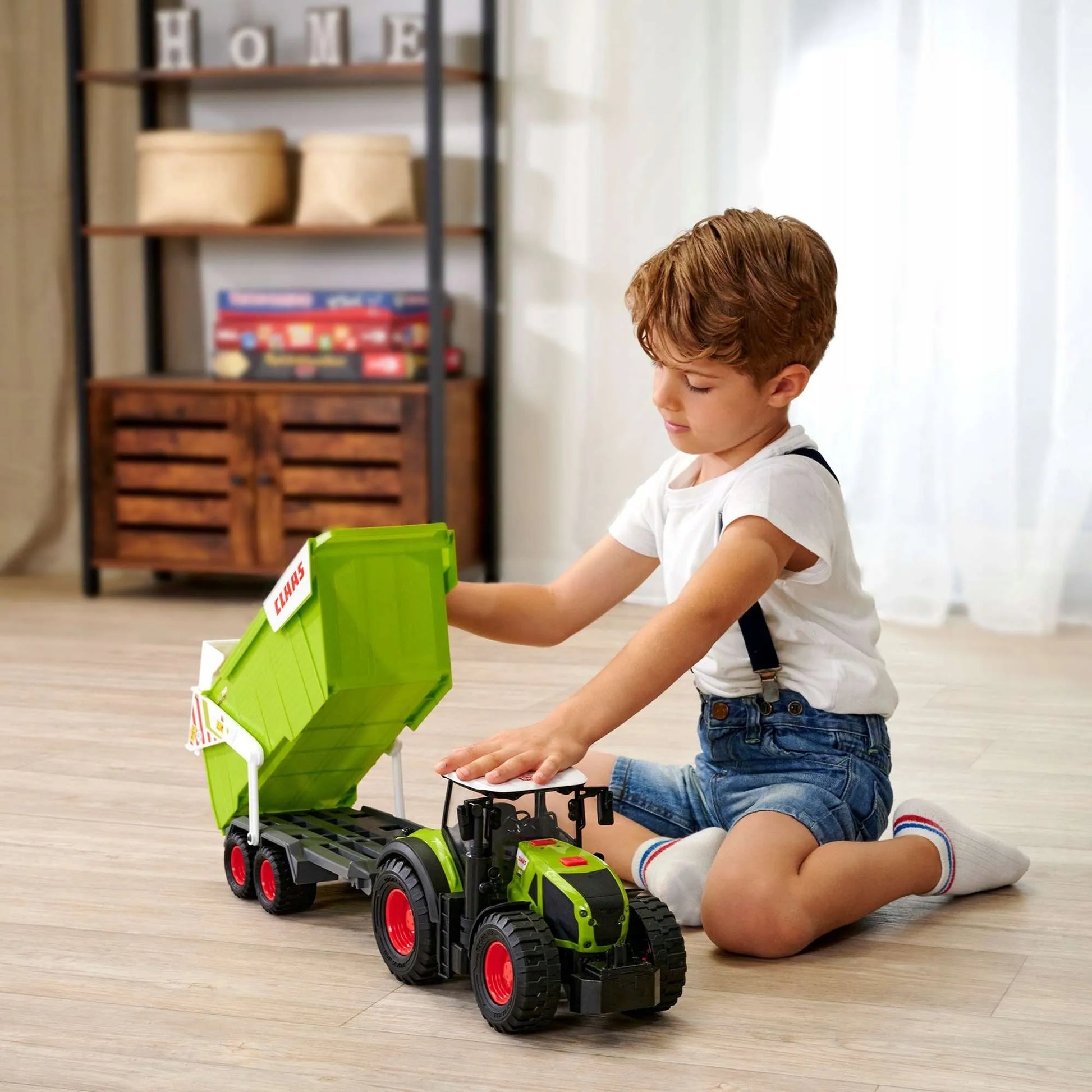 Didelis interaktyvus traktorius su priekaba Claas su šviesos ir garso efektais 64 cm