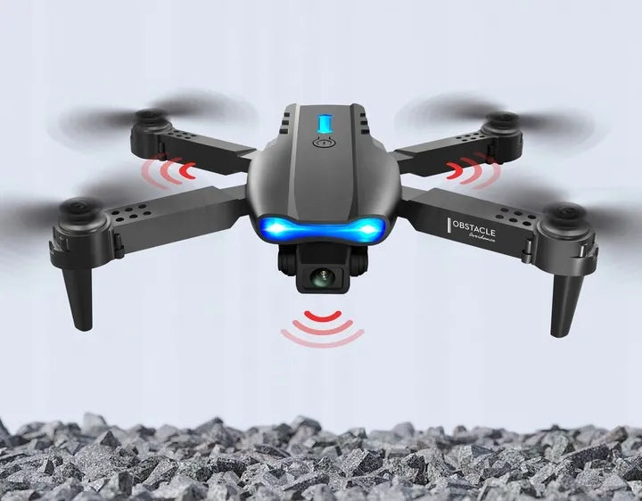 E99 dronas su 2 kameromis, „Wi-Fi“, aukščio palaikymu, kliūčių aptikimu, nuotolinio valdymo pultu ir dėklu