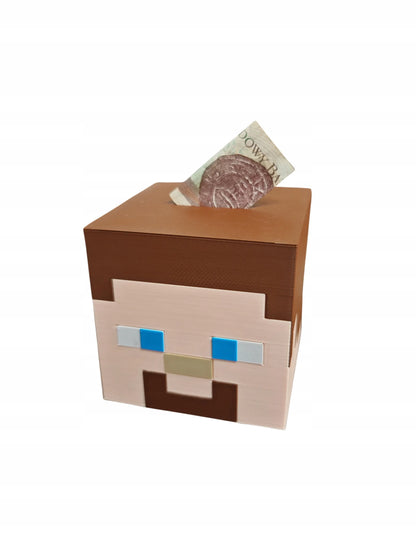 „Minecraft“ Steve galvos formos atidaroma taupyklė – puiki dovana vaikui ir stilingas žaidimų kambario aksesuaras