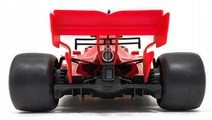 Nuotoliniu būdu valdomas raudonas „Ferrari“ „Formulės 1“ automobilis RC 1:12