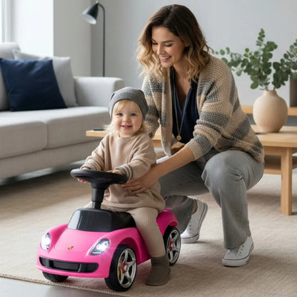Rausvas vaikiškas pasispiriamas automobilis „Porsche Carrera GT“ su šviesomis