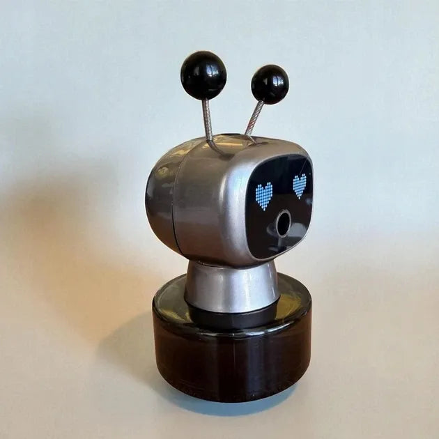 Sidabrinis automobilio kvapų difuzorius-robotas